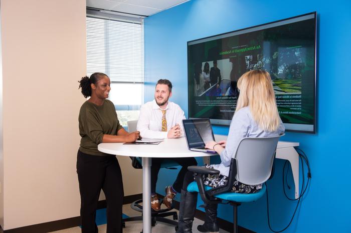 Students socializing at the downtown campus location.