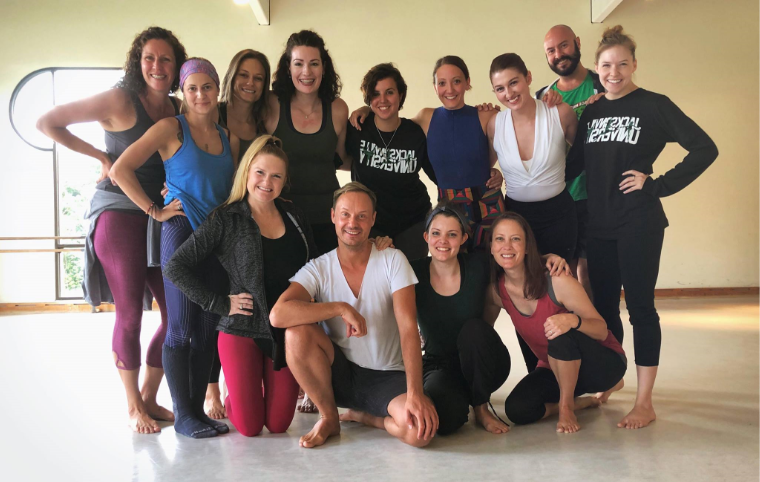 A group of students posing for a photo after class.